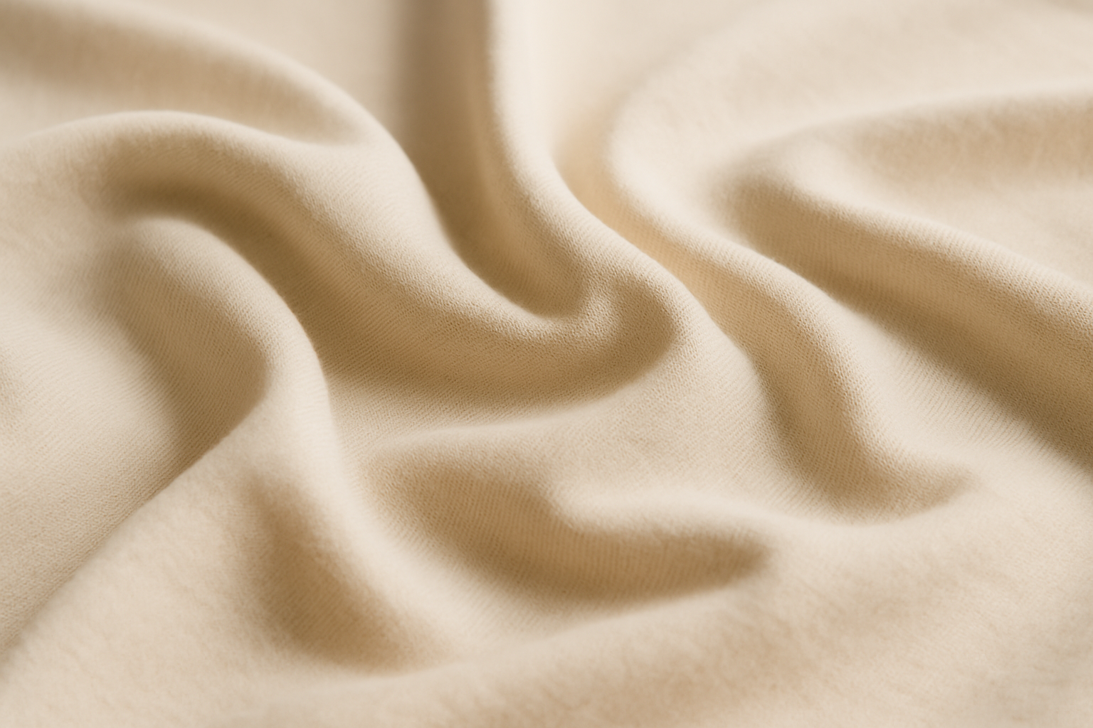 Close-up of sustainable beige organic hemp-cotton fabric by VELU, soft and breathable texture made in Canada
